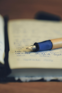 Vintage fountain pen and notebook